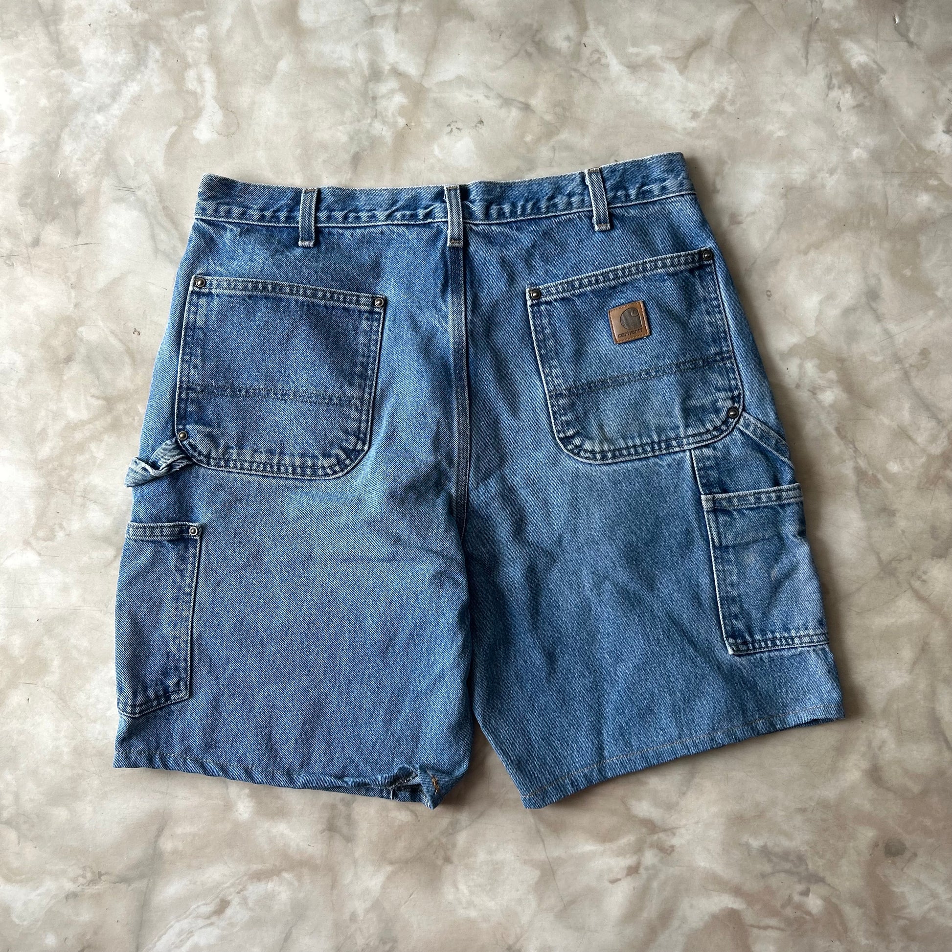 Vintage Bram's Vintage Carhartt Dungaree Loose Fit Double Knee Short Blue in Blue — sustainable streetwear from Bram's Vintage