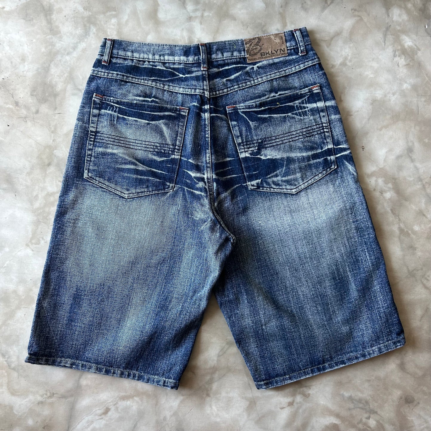 Vintage Bram's Vintage Faded Dark Blue Baggy Fit Jean Shorts Jorts in Blue — sustainable streetwear from Bram's Vintage