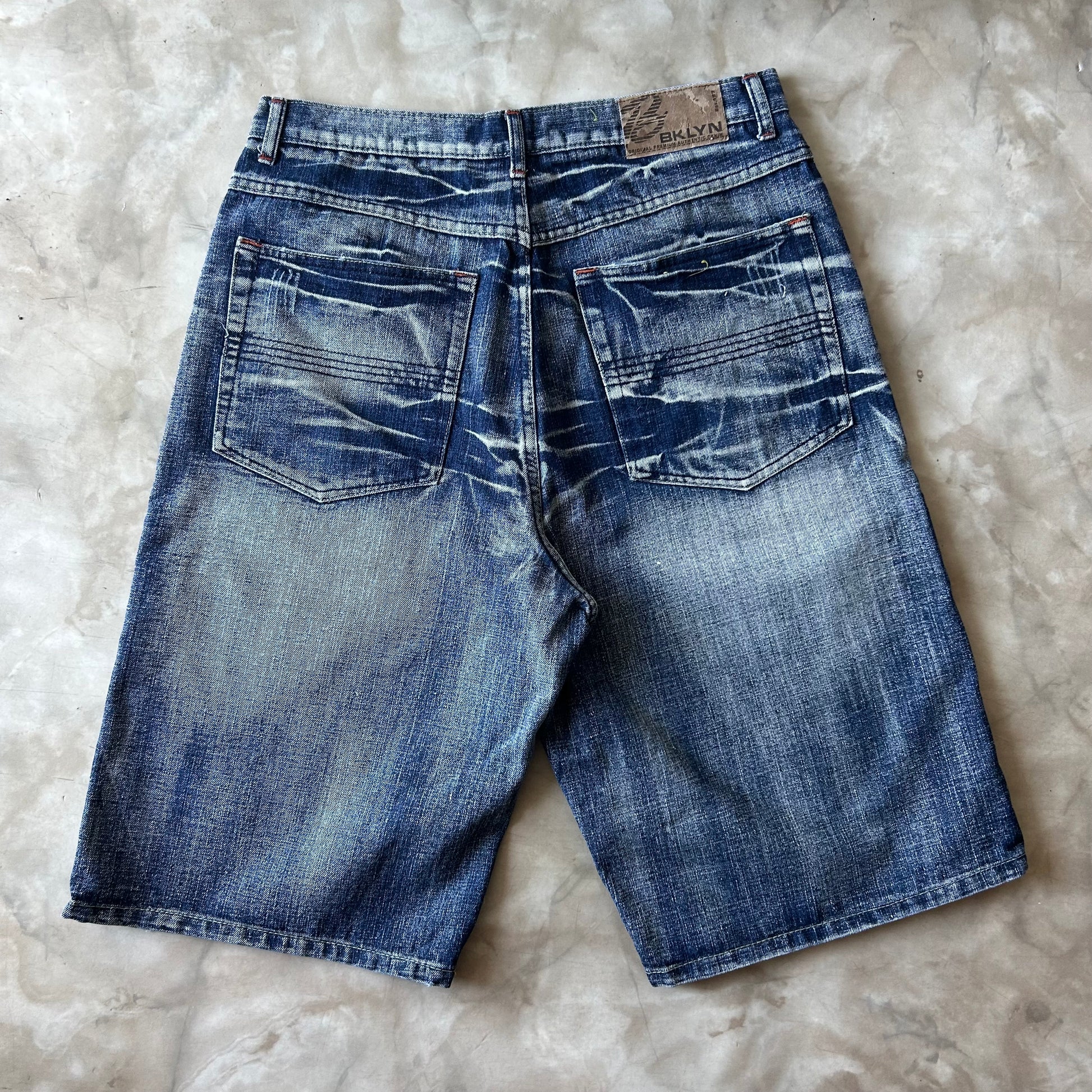 Vintage Bram's Vintage Faded Dark Blue Baggy Fit Jean Shorts Jorts in Blue — sustainable streetwear from Bram's Vintage