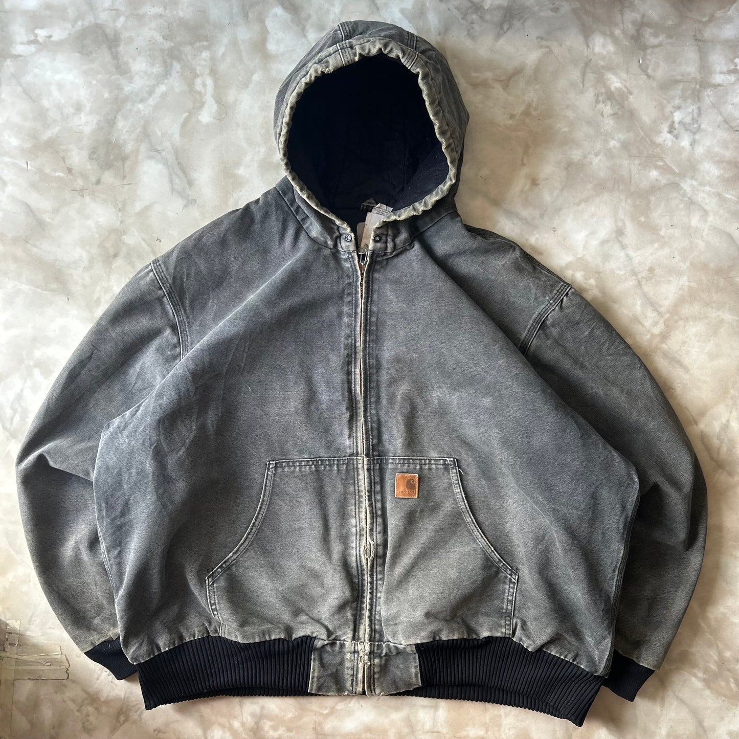 Vintage Bram's Vintage Carhartt Faded Distressed J130 Active Jacket Black in Black — sustainable streetwear from Bram's Vintage