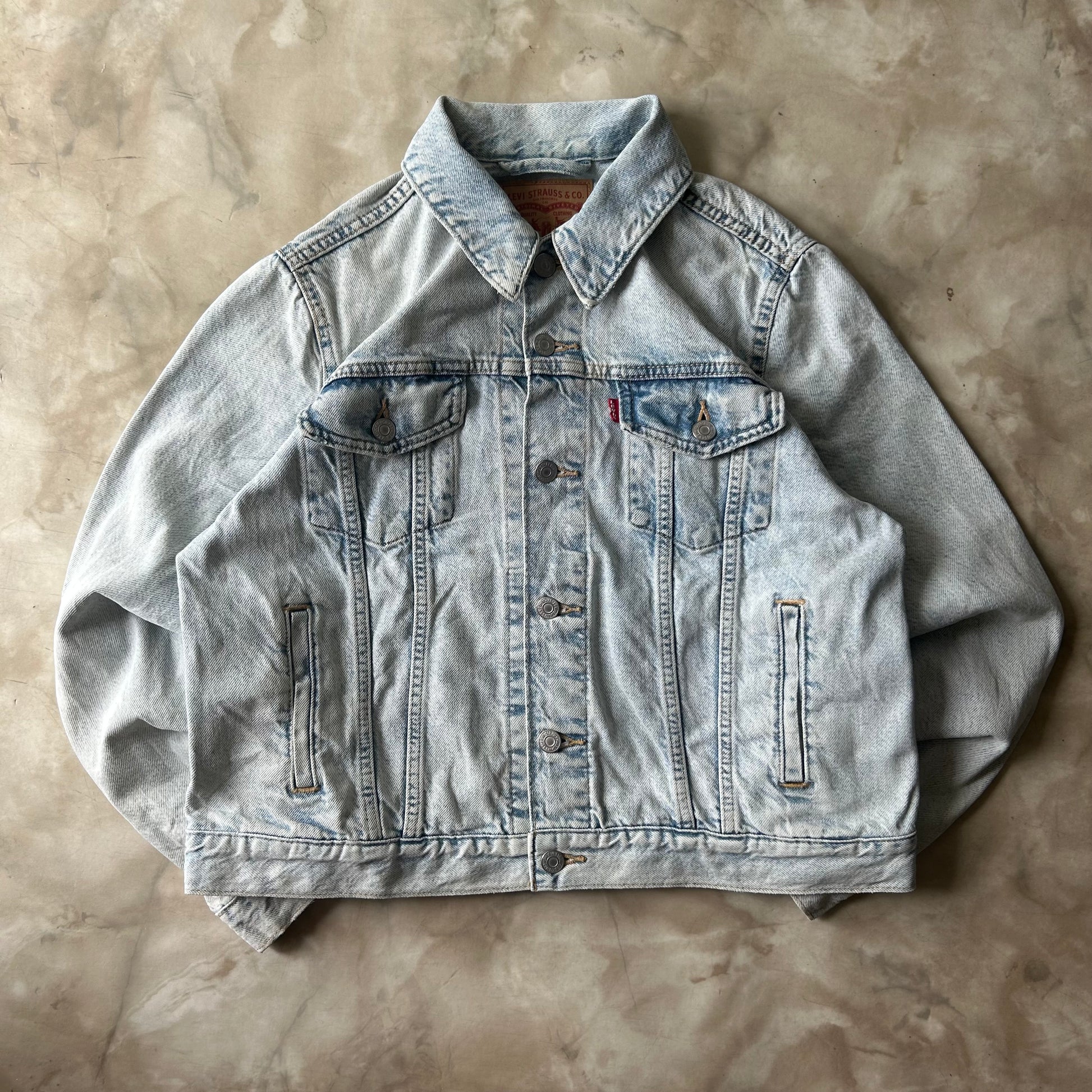 Vintage Bram's Vintage Levi's Faded Distressed Denim Jacket Light Blue (women's) in Blue — sustainable streetwear from Bram's Vintage